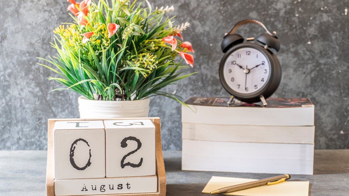 Clock and calendar next to property documents representing search turnaround time