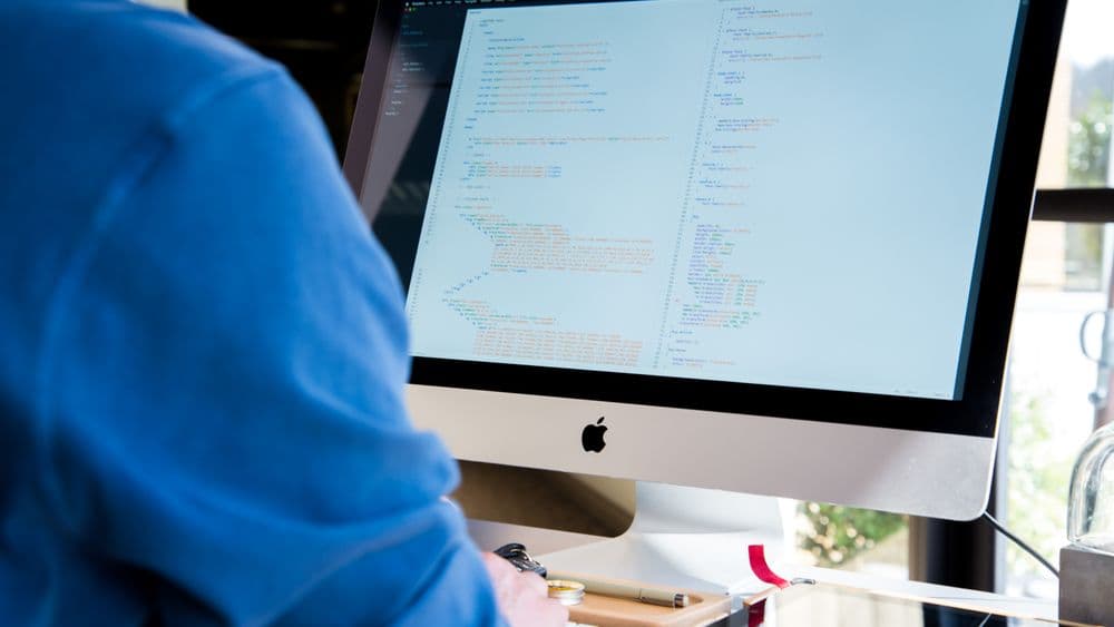 A search firm processor matching a property address to a UPRN before sending the council request