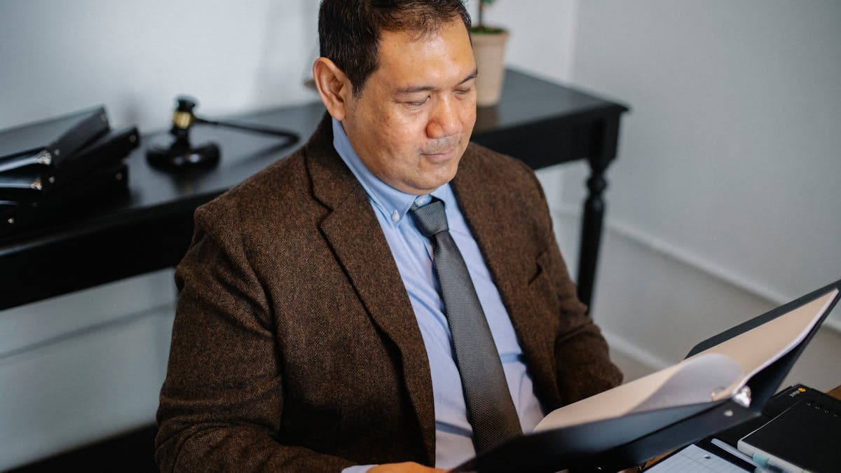 Solicitor at desk reviewing search results for a property transaction