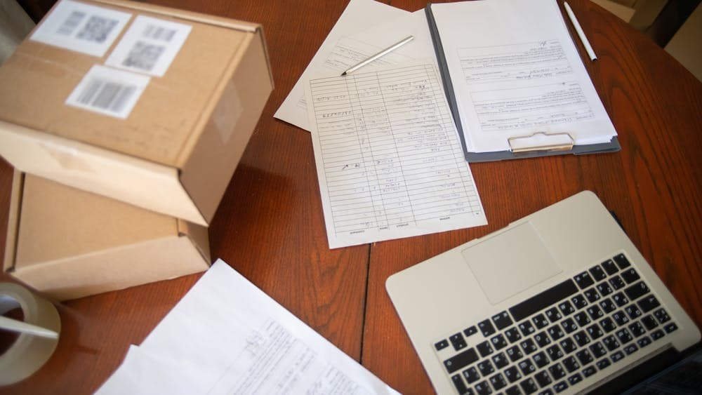 Search Code documents and an insurance file on a desk