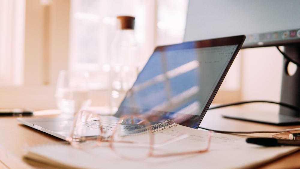 An overflowing shared email inbox with dozens of unread messages