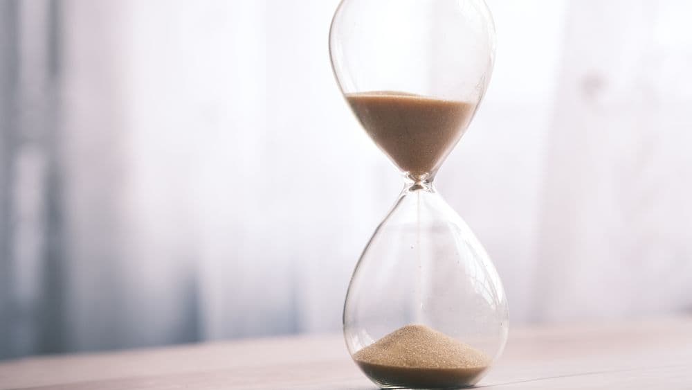 An hourglass representing search turnaround time